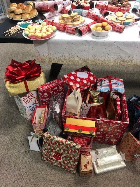 Christmas at NLS 6 presnets 2 e1545388655748 Solicitors London